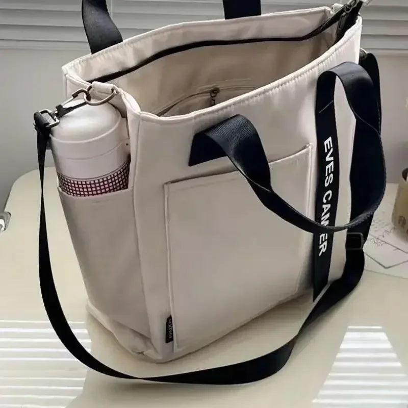 Nieuwe Casual Tote Schoudertas met grote capaciteit Nylon Waterdichte canvas handtas Eenvoudige mode Messenger Bags voor schoolmeisje