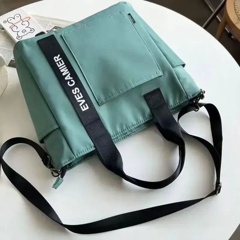 Nieuwe Casual Tote Schoudertas met grote capaciteit Nylon Waterdichte canvas handtas Eenvoudige mode Messenger Bags voor schoolmeisje