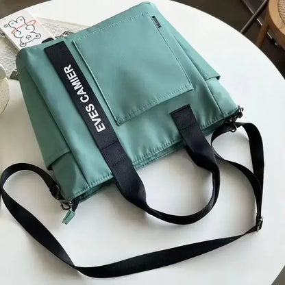 Nieuwe Casual Tote Schoudertas met grote capaciteit Nylon Waterdichte canvas handtas Eenvoudige mode Messenger Bags voor schoolmeisje